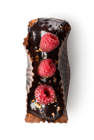 Eclair with chocolate glaze isolated on whiteの写真素材
