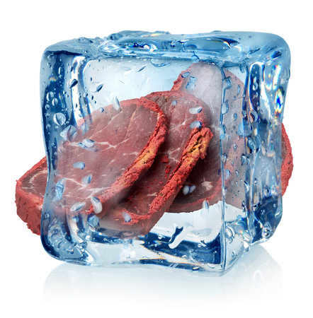Basturma in ice cube isolated on a white backgroundの写真素材