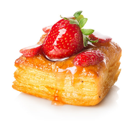 Cake of puff pastry with strawberry isolated on whiteの写真素材
