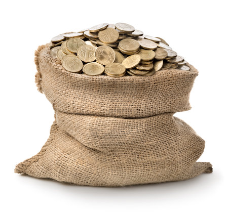 Bag with coins isolated on a white backgroundの写真素材