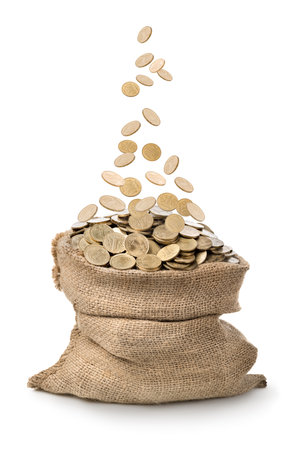 Money fall into the bag. Isolated on whiteの写真素材
