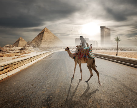 Cloudy evening over the road to pyramidsの写真素材