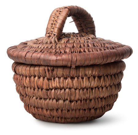 Wicker basket with a cover isolated on white backgroundの写真素材