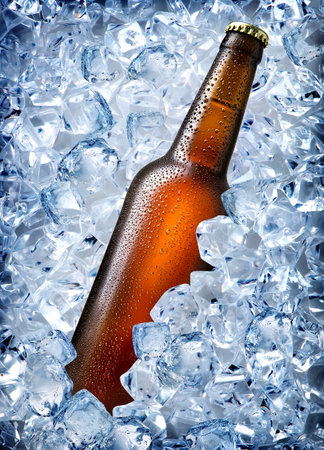 Brown bottle in ice isolated on whiteの写真素材