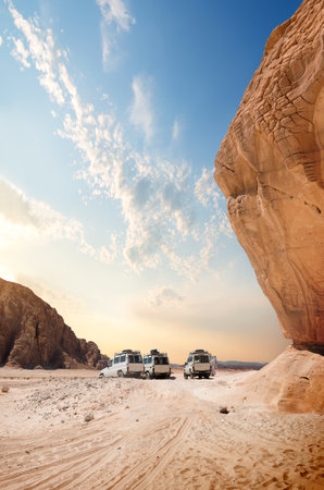 Mountains and sand dunes at the sunsetの写真素材