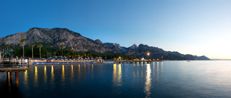 Sea and mountains in eveningの写真素材
