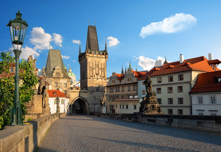 Early morning on Charles Bridge in Prague at summerの写真素材