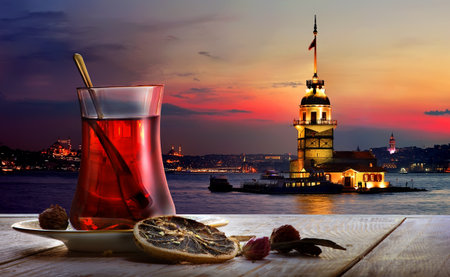 Turkish tea in the background of the maiden tower in Istanbulの写真素材