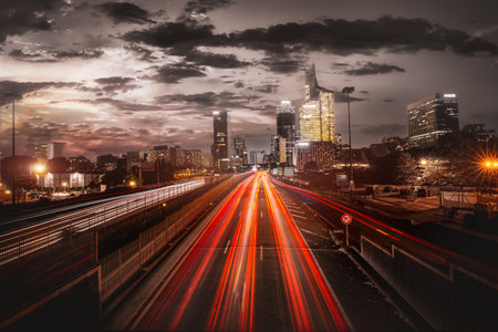 Subway to skyscrapers in La Defense district at sunset, Parisの写真素材