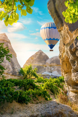 Hot air balloons flying over Cappadocia, Turkeyの写真素材