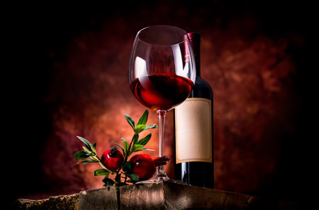 Pomegranate wine on a wooden table in a glass bowlの写真素材