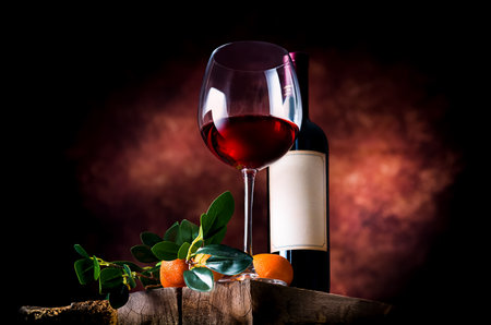 Pomegranate wine on a wooden table in a glass bowlの写真素材