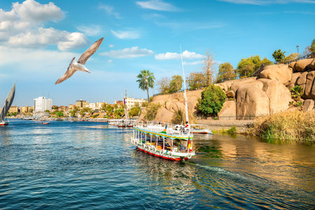 River Nile and boats at sunset in Aswanのeditorial素材