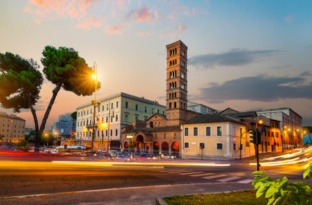 Bell tower of Santa Maria in Cosmedin on the street of Romeの写真素材