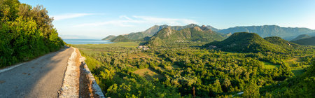 View on Petrovac and its beach in summer full of touristsの写真素材
