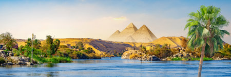 Panorama of the Great Nile near Aswan and pyramidsの写真素材