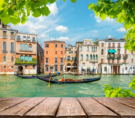 Wooden table with a view of Veniceの写真素材
