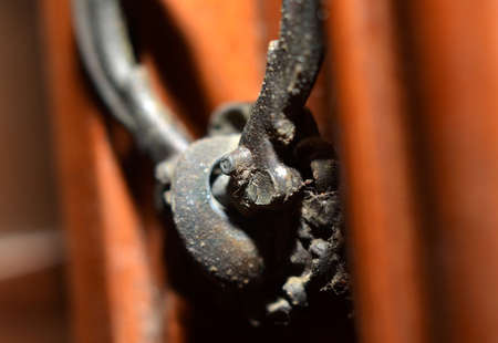 door handles made of carved brass are blackish brown dirty and worn due to old age