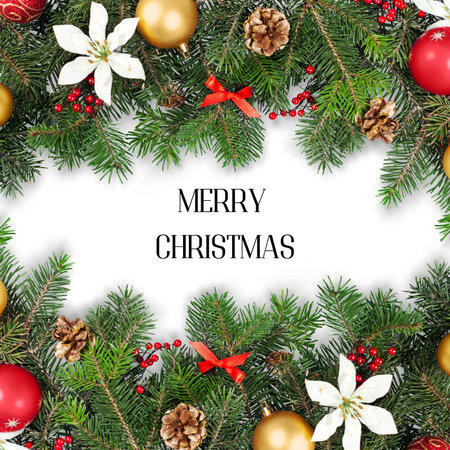 merry christmas written on a white background with green christmas branches with red baubles white flowers golden balls pine and red ribbonsの写真素材