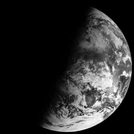 The Earths winter solstice, half earth night time, black and white world photo.の写真素材