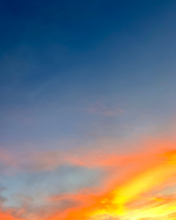 Dramatic sunset sky with colorful clouds background concept. Evening sunset. Twilight sky.
