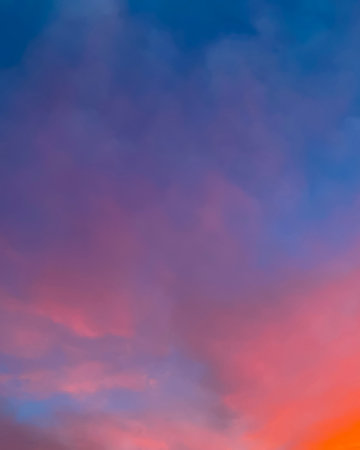Dramatic sunset sky with colorful clouds background. Evening sunset. Twilight sky.