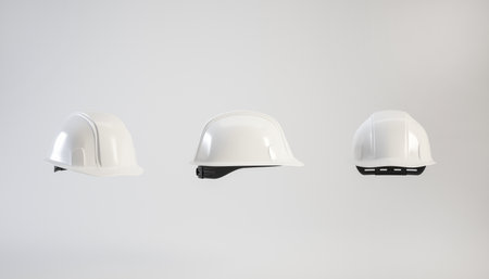 Set of white hard hat isolated on white, 3d render. White helmet for Labour Day concept.の写真素材