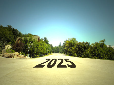 2025 written on an empty road and beautiful landscape. Concept for new year resolutions 2025.の写真素材