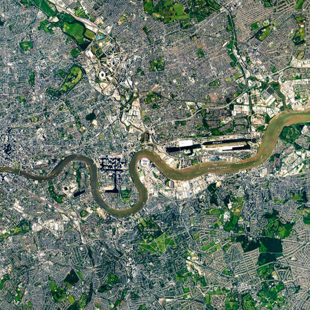 Aerial top view or satellite map of East London, United Kingdom. Showing River Thames, The O2 Arena,...