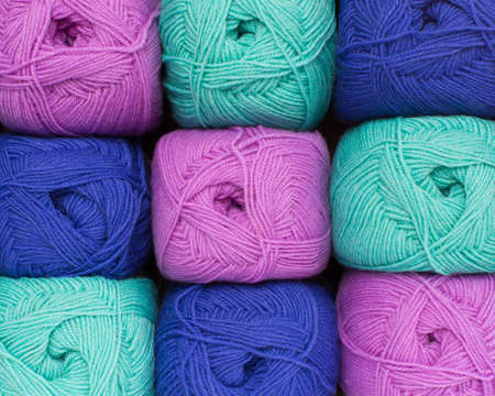 Colorful threads. Knitting background. Knitting yarn for handmade winter clothes.の写真素材