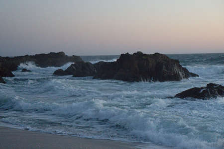 rough rocky ocean closeup at sunset