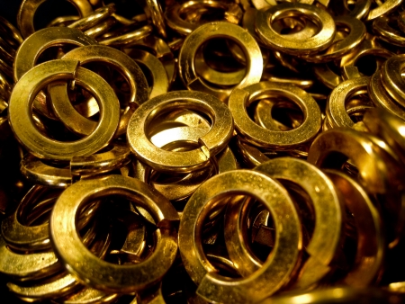 A lot of brass spring washersの写真素材