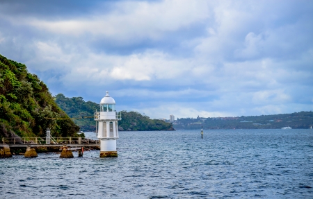 White lighthouse in the seaの写真素材