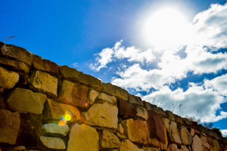 Stone wall with blue skyの写真素材