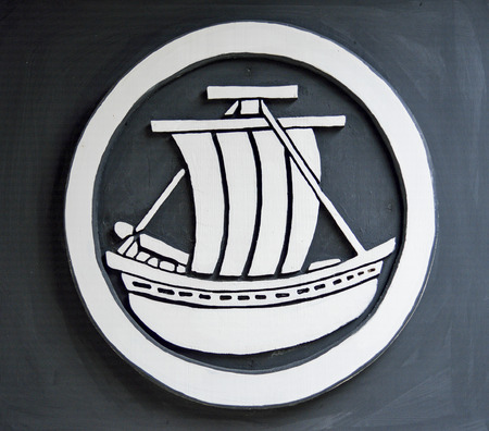 Boat symbol on the wallの写真素材