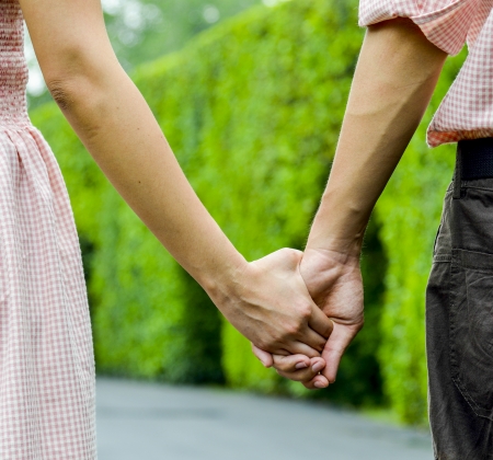 Hold hands of the couple1の写真素材