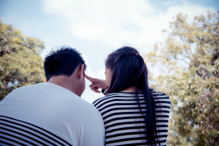 Sweety couple sit togetherの写真素材