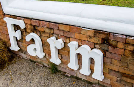 Farm word on the wallの写真素材