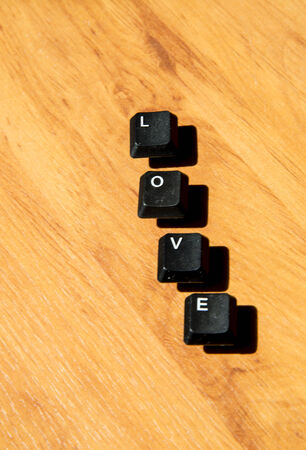Love word on the laminate floorの写真素材