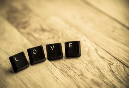 Love word on the wooden floorの写真素材