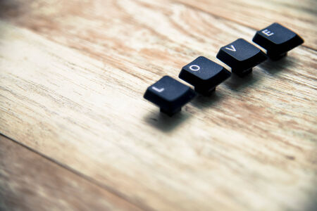 Love word on the wooden floorの写真素材