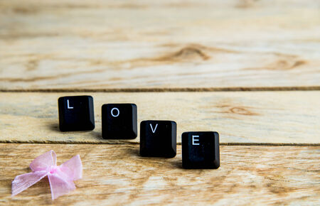 Love word on the wooden floorの写真素材