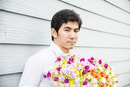 Man with bush flower