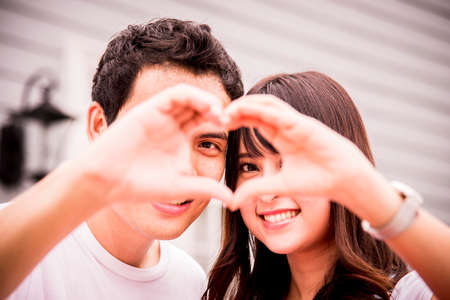 Lovely couple with love hand sign2