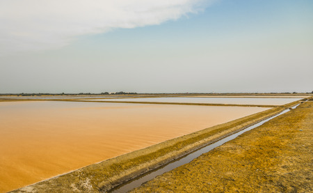 Orange salt pan with blue sky2の写真素材