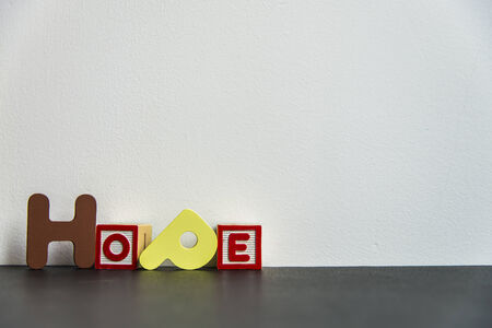 Colorful wooden word hope with white backgroundの写真素材