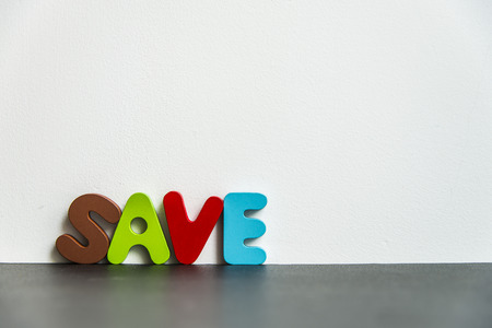 Colorful wooden word Save with white backgroundの写真素材