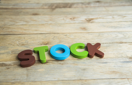 Colorful wooden word Stock on wooden floorの写真素材