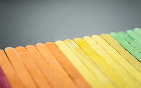 Colorful wooden stripe on black board 10の写真素材