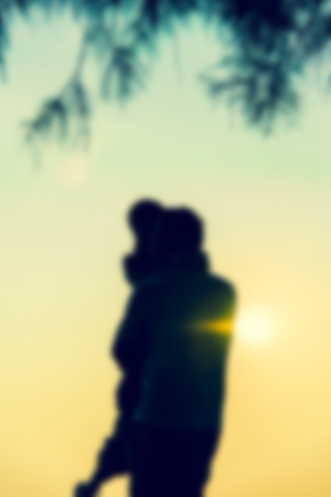 Lovely Couple on sunset scene in Blur styleの写真素材